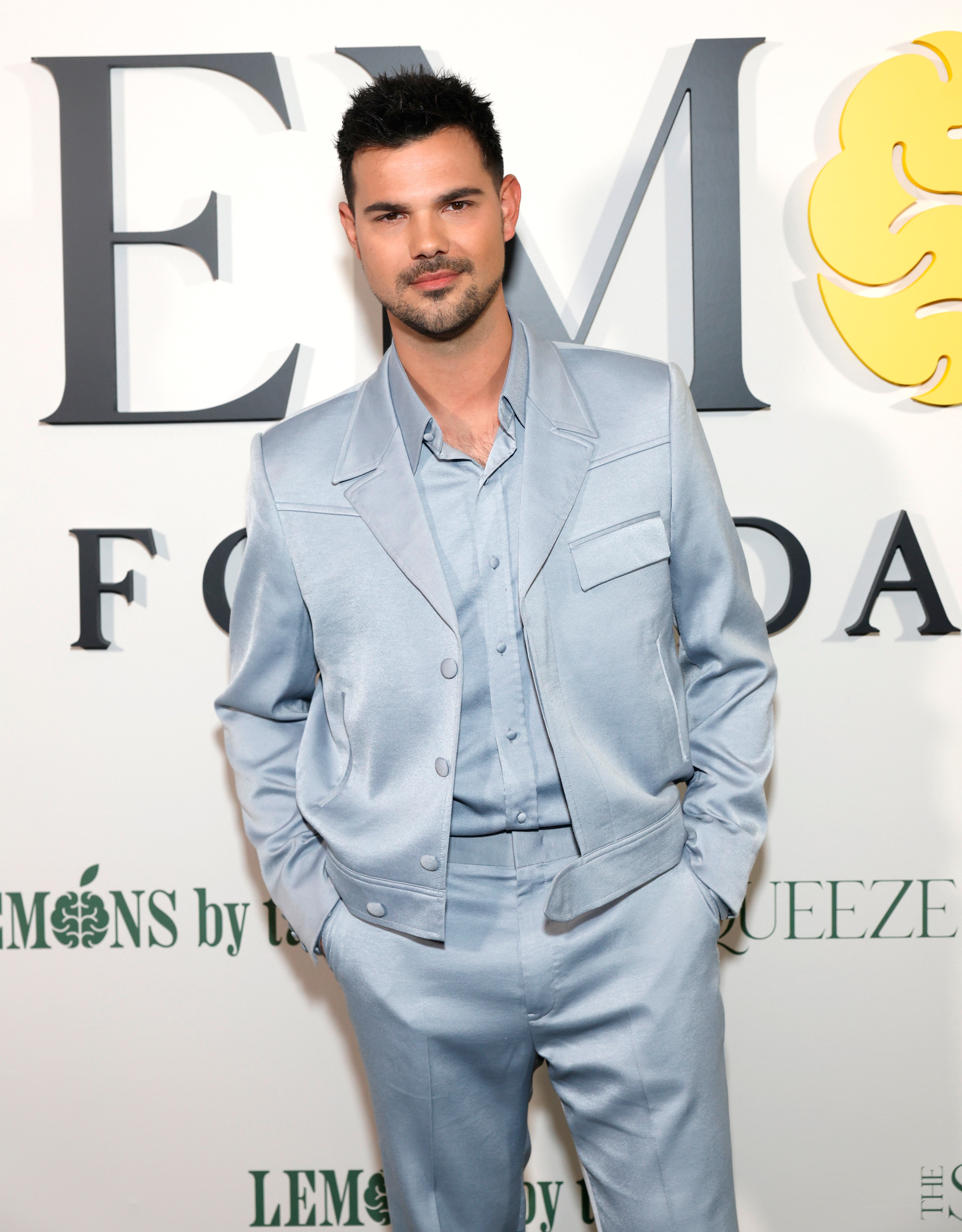 closeup of him in a suit for an event