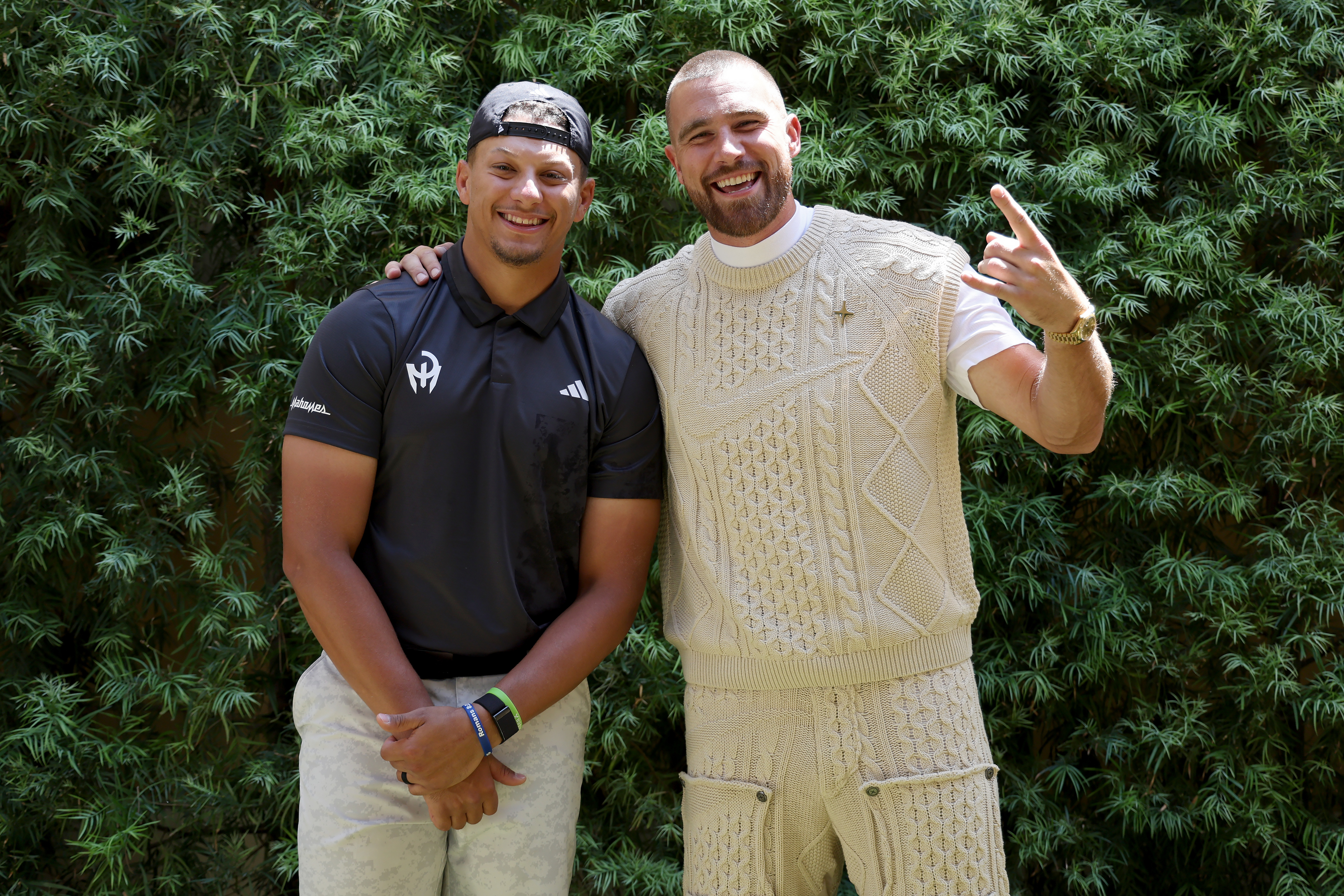 Patrick and Jason smiling together