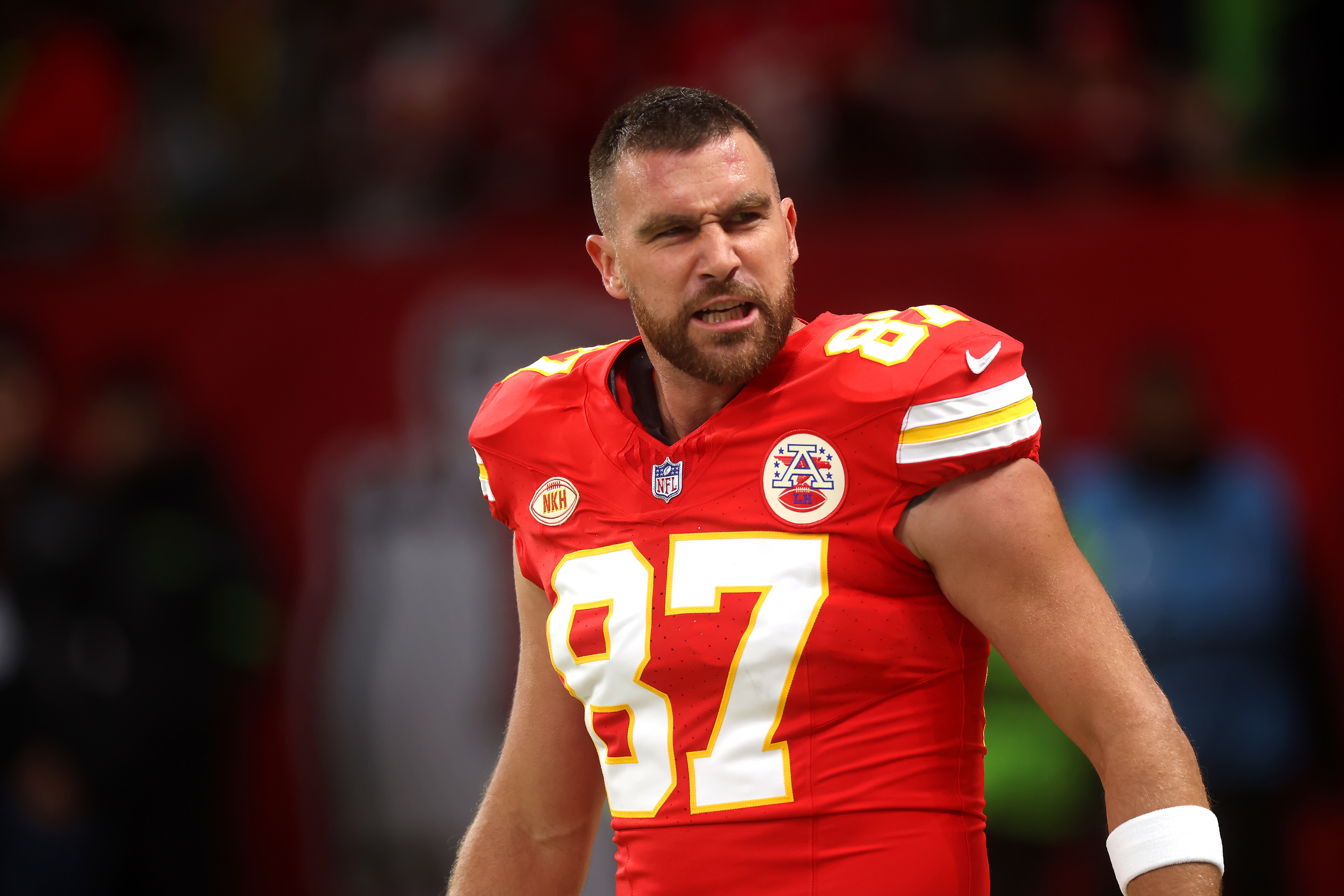 Close-up of Travis in his football uniform