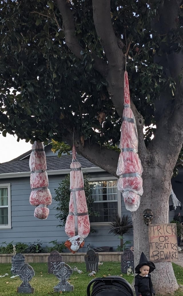 bloody hanging bodies on a tree