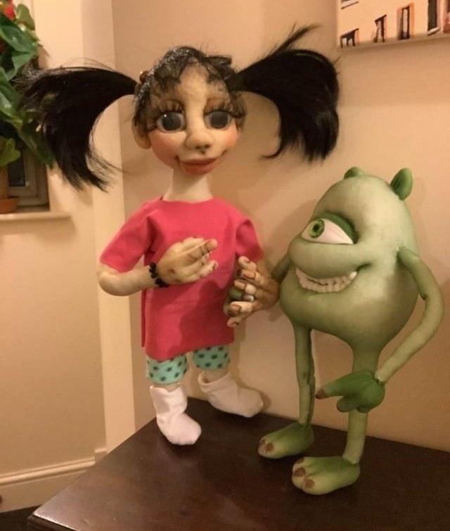 a large doll that is supposed to be Boo from Monsters Inc but it just looks frightening because the facial features are off