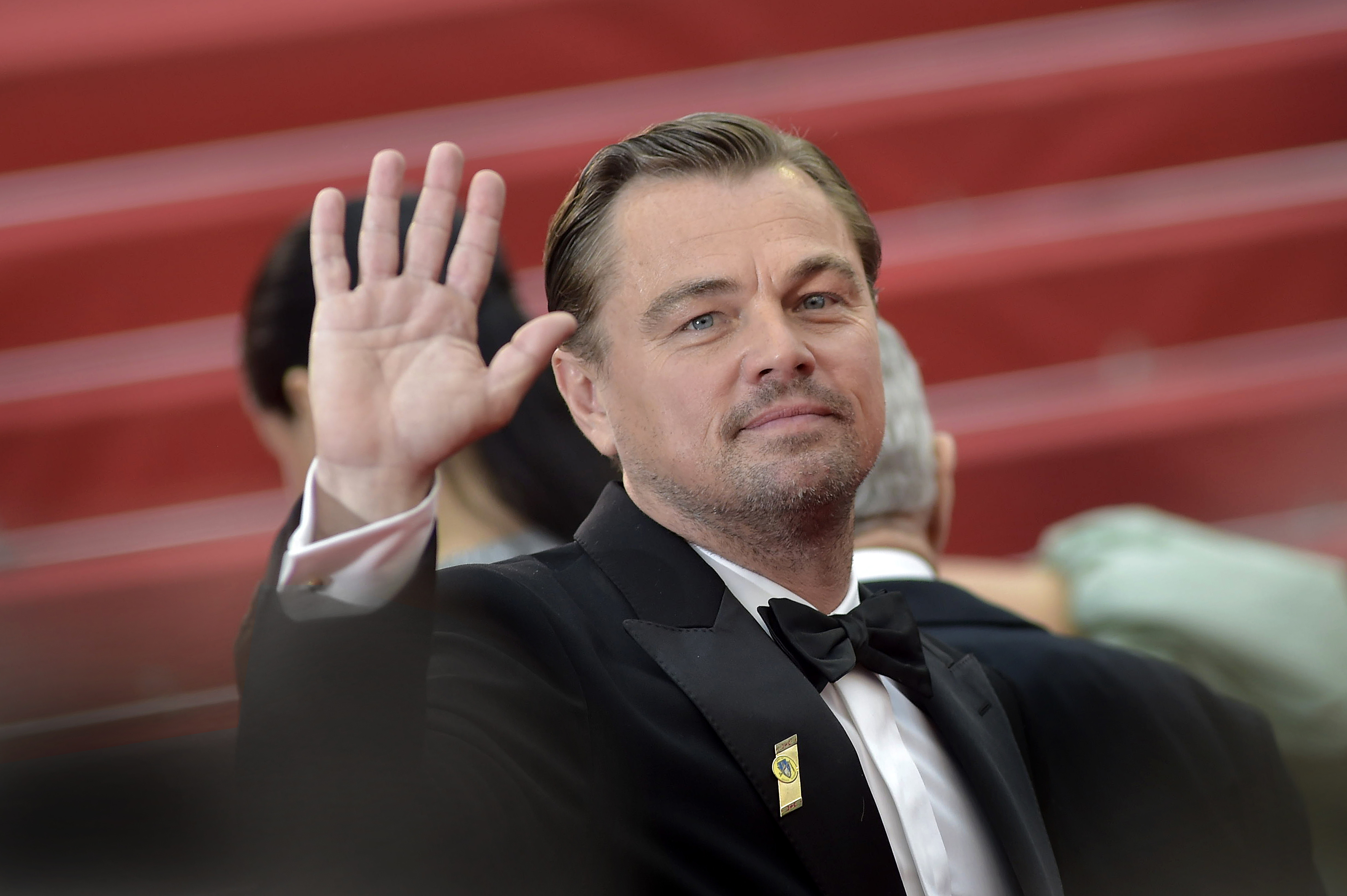 closeup of Leo waving
