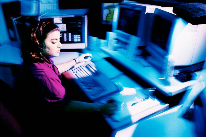 A call center operator at her computer