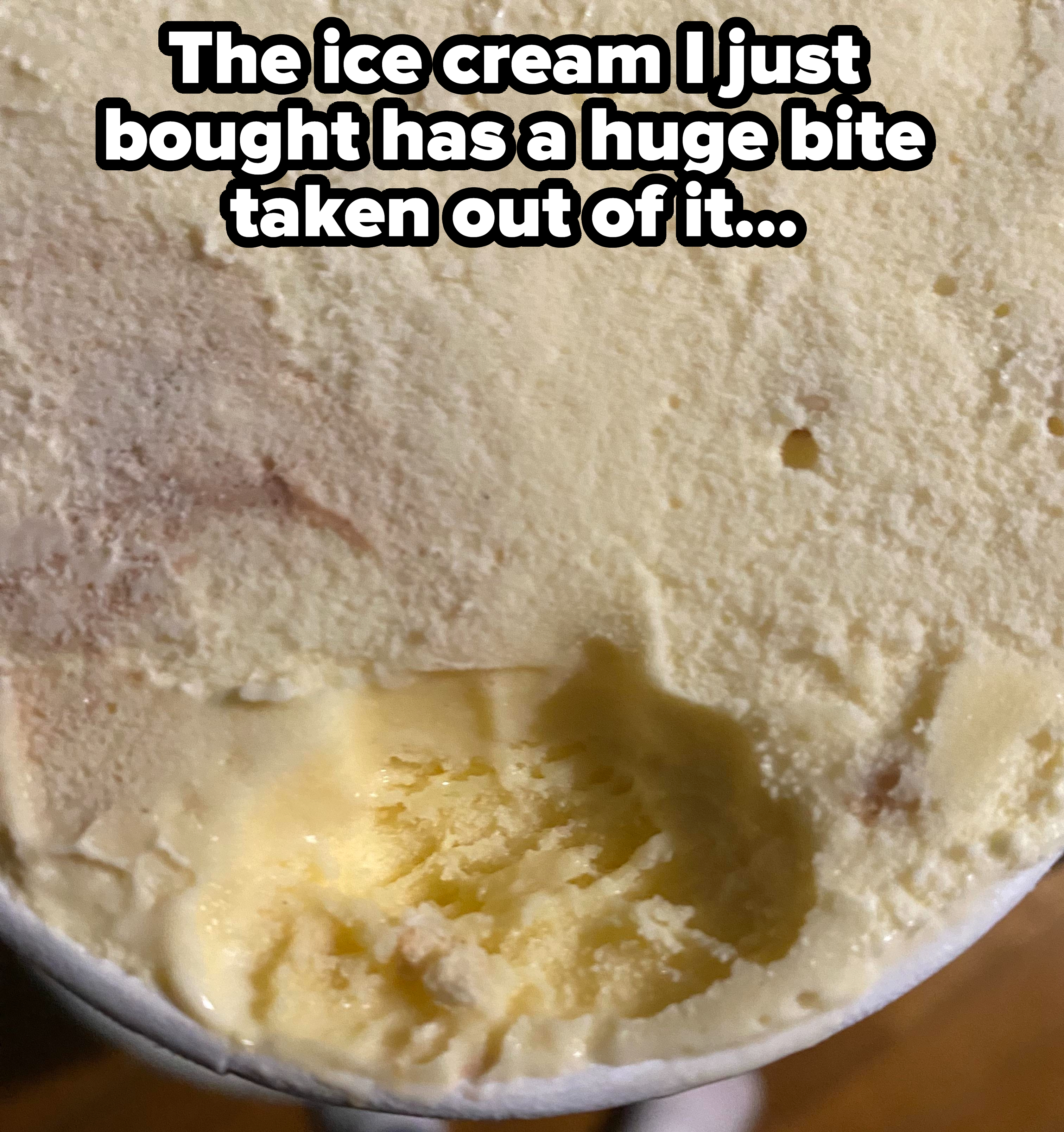 Ice cream with a bite missing