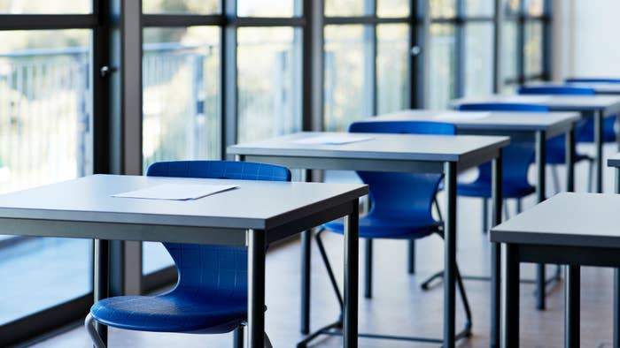 empty school desks are shown