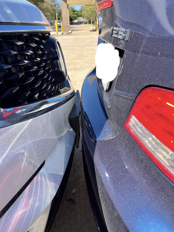 a car touching another car