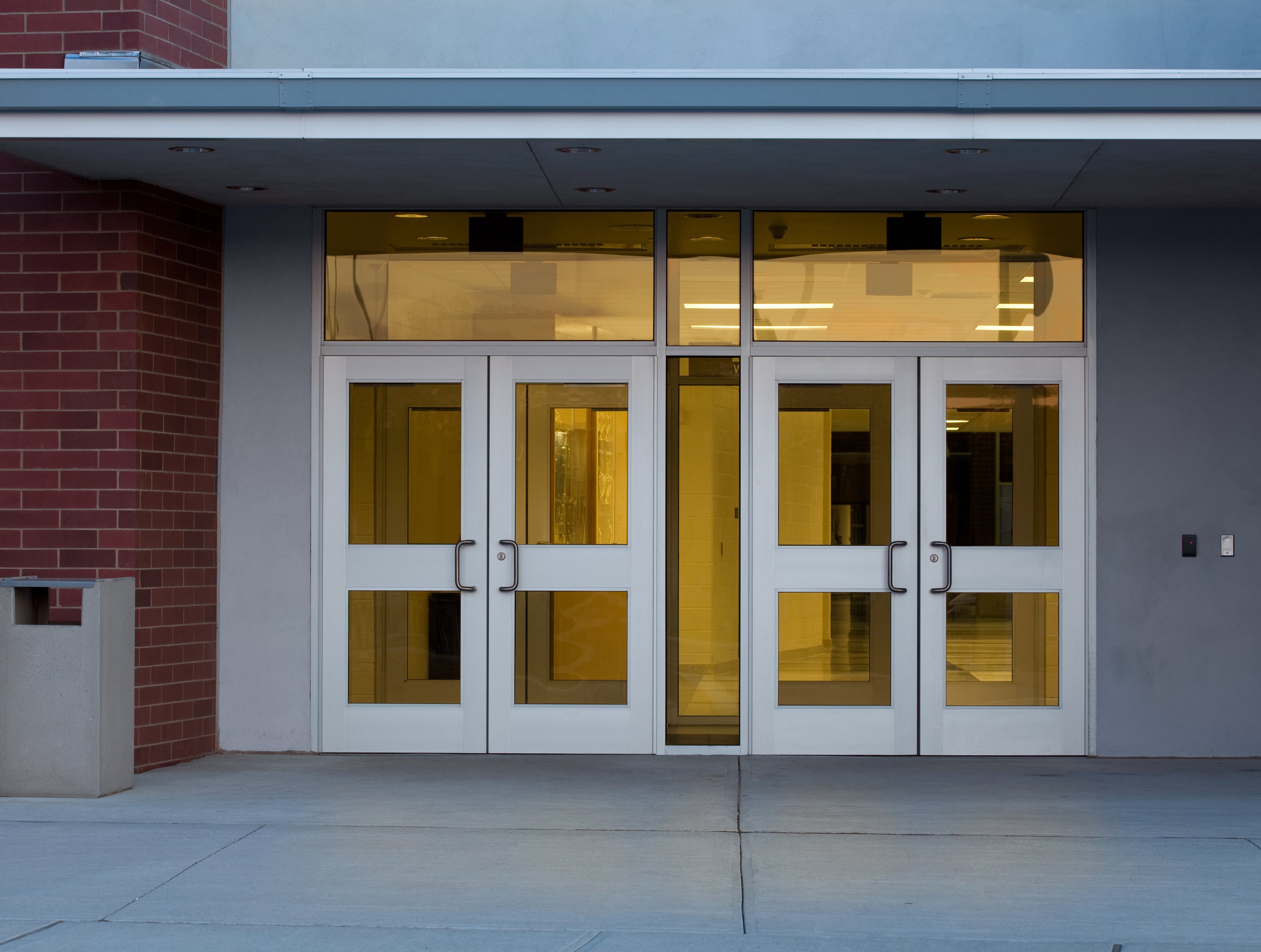 school doors at entrance of building