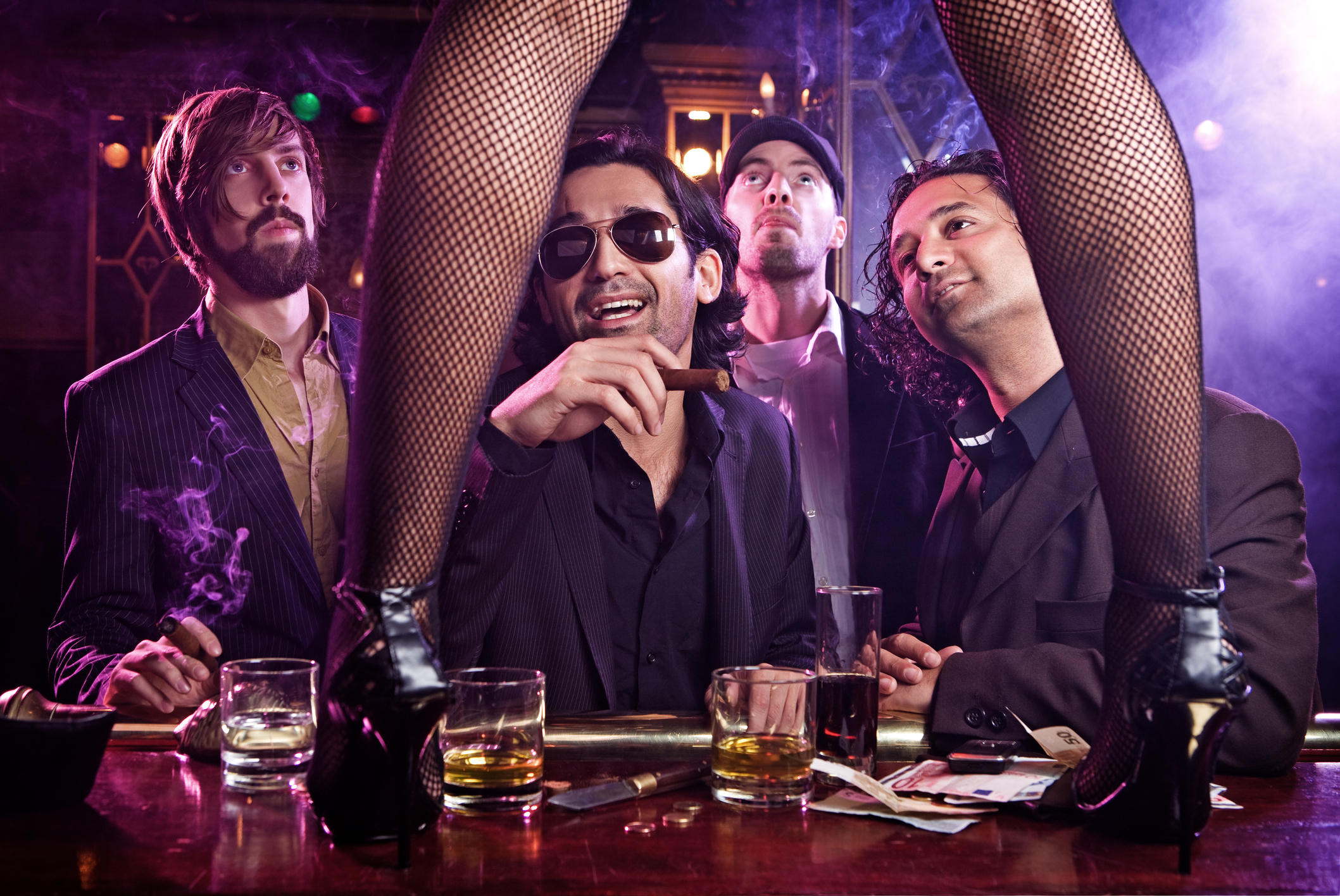 men at a strip club