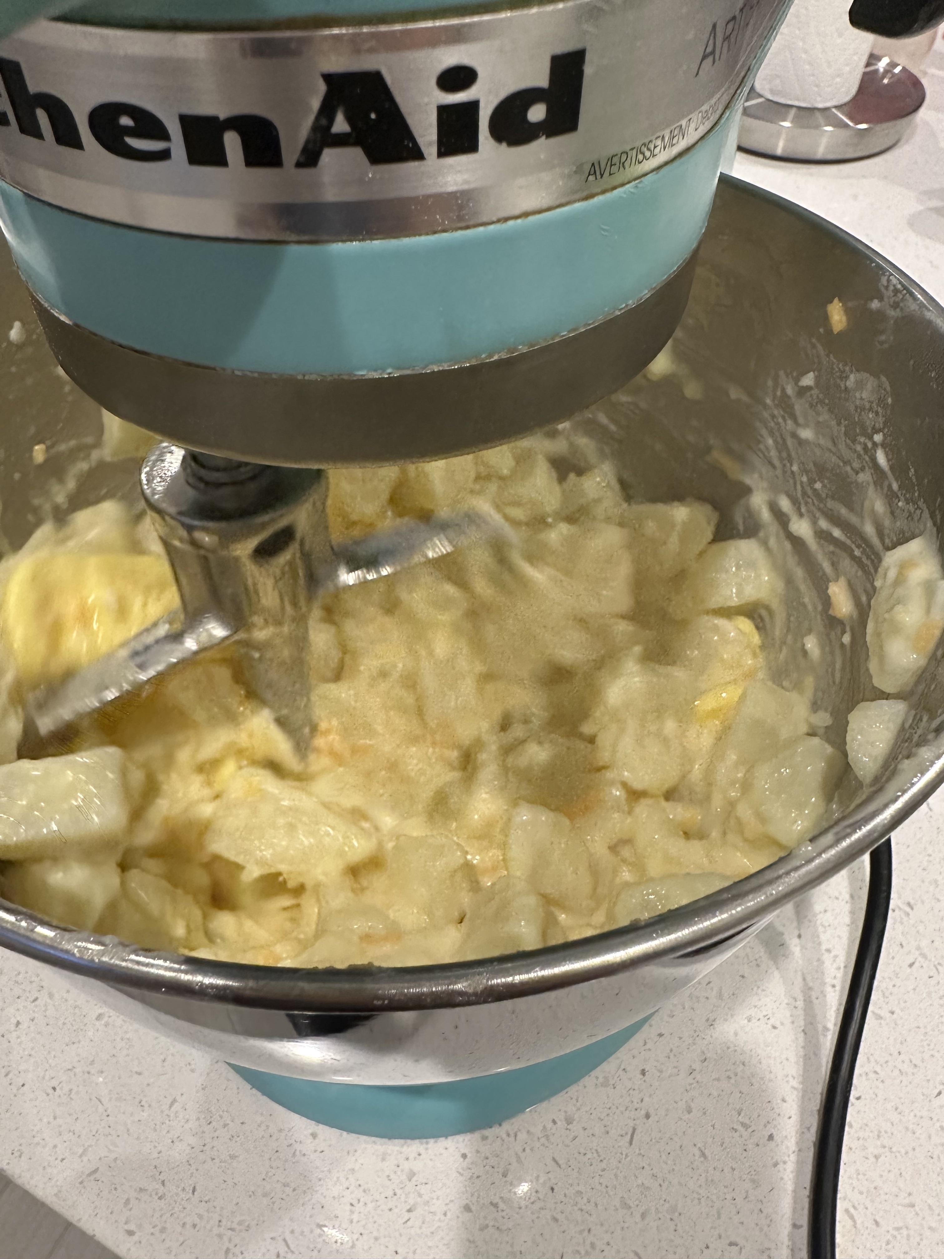 a mixer making mashed potatoes