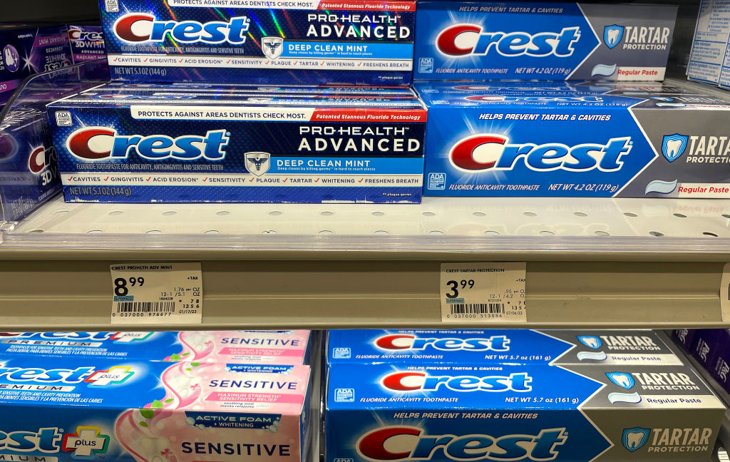 A toothpaste shelf in a store