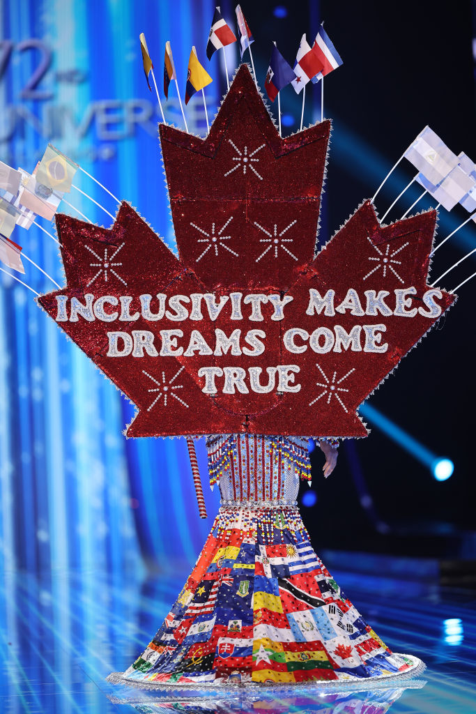 The back of the wings says &quot;Inclusivity makes dreams come true&quot;