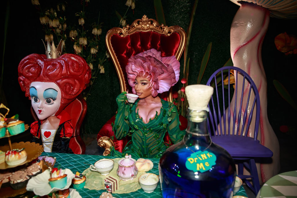 Closeup of Megan Thee Stallion at a an Alice in Wonderland party