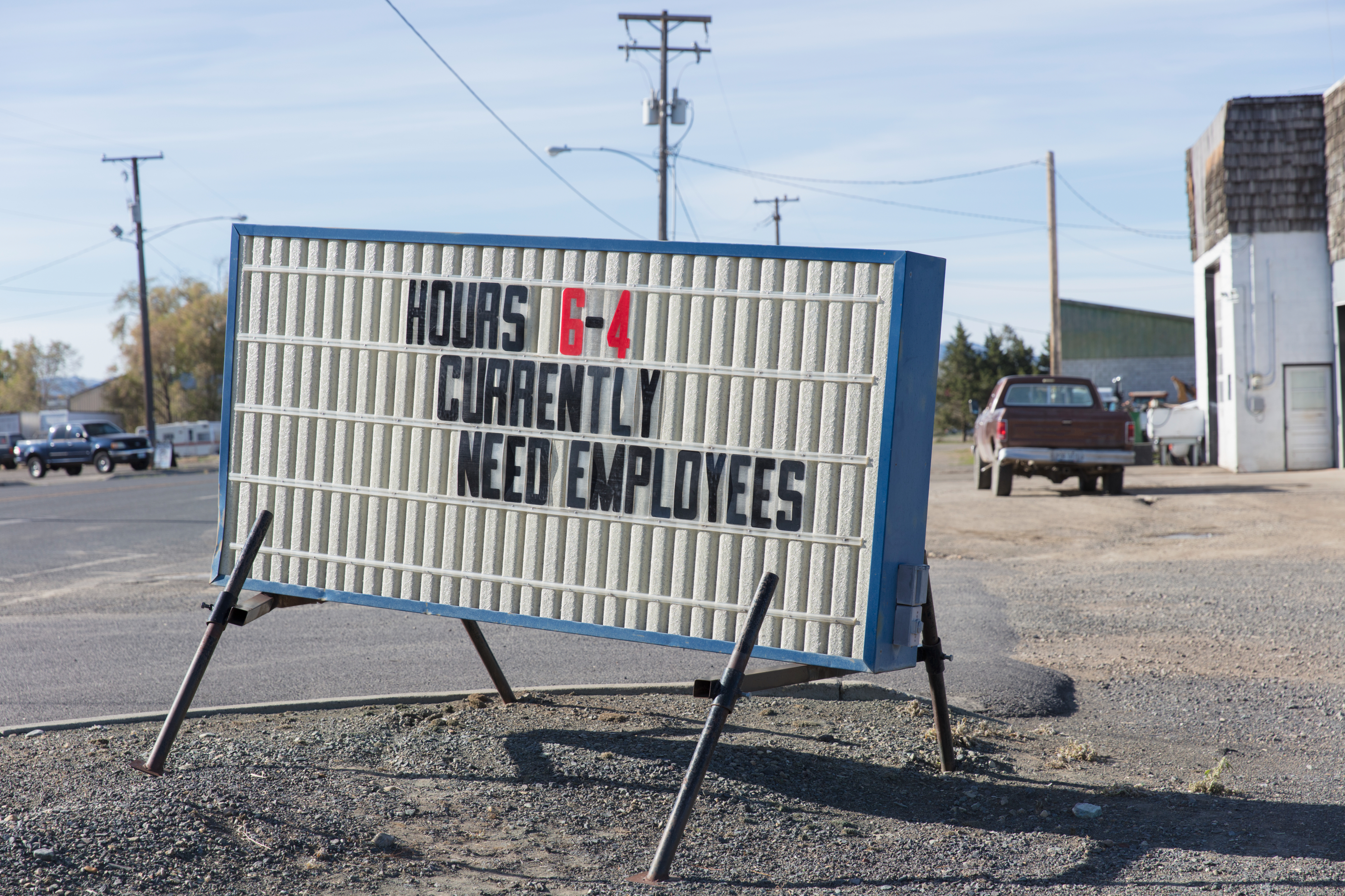 A sign asking for employees