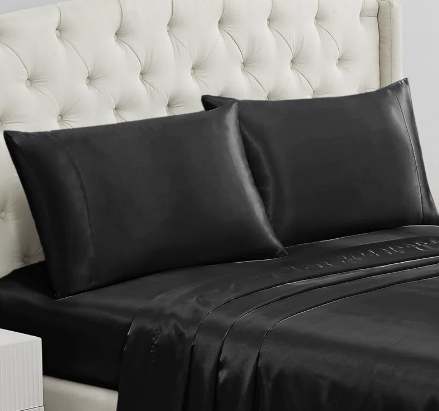 A set of black satin pillowcases
