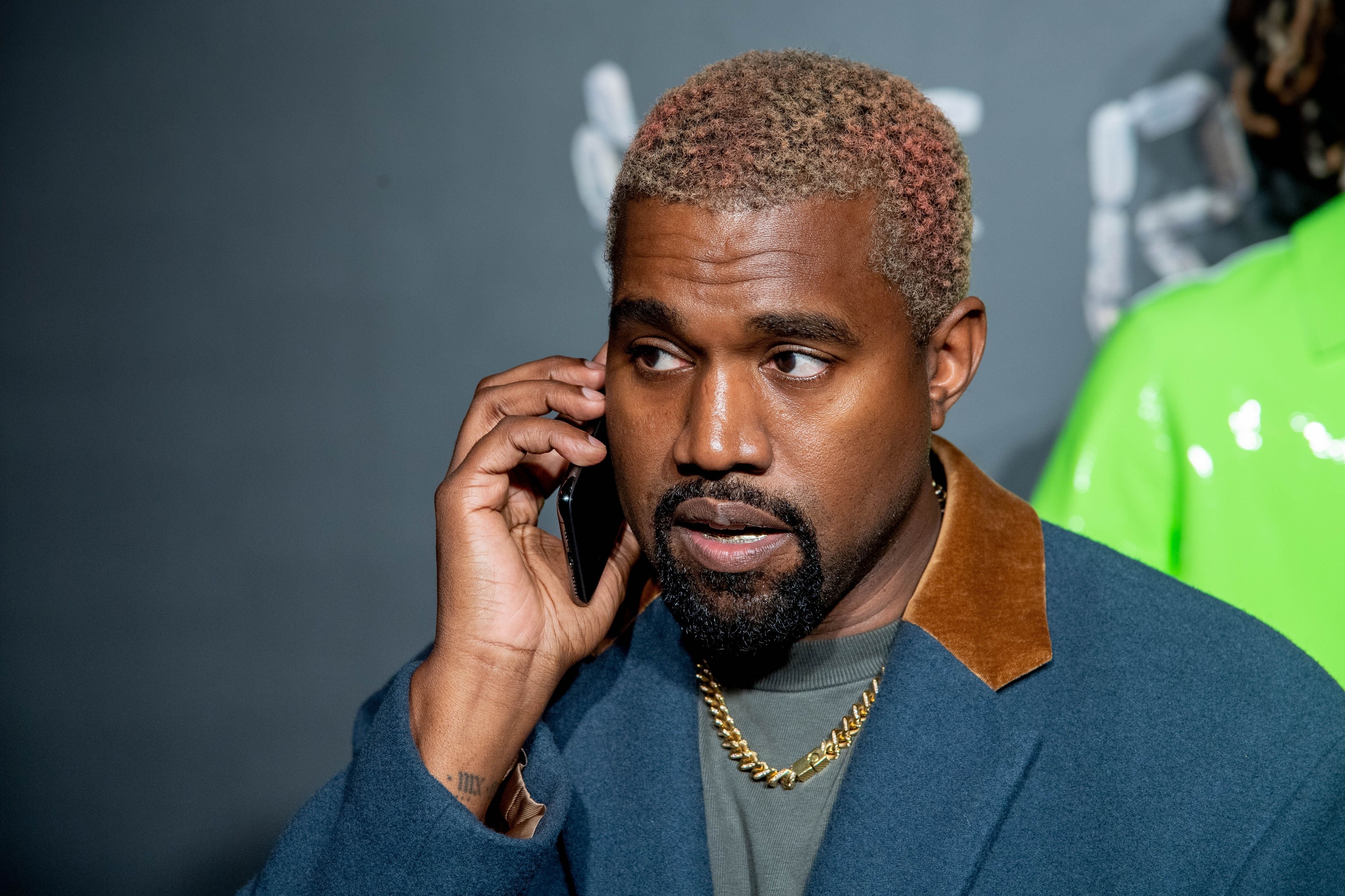 Closeup of Kanye on the phone