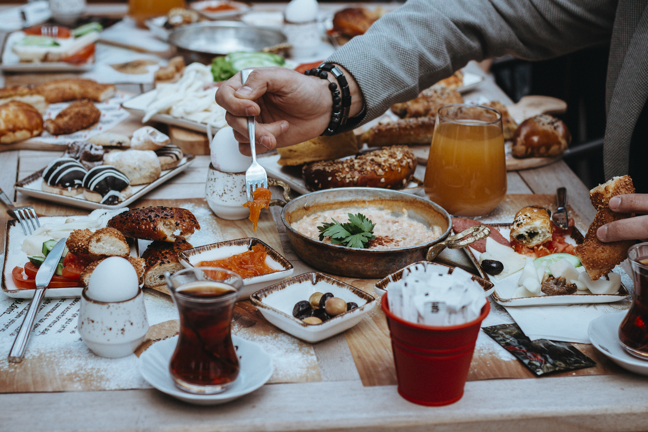 a table in a restaurant featuring a large turkish breakfast