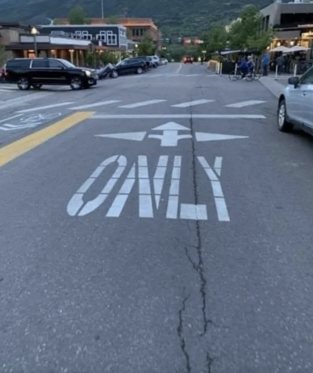 painted arrows on the street going in every direction but it says &quot;only&quot;