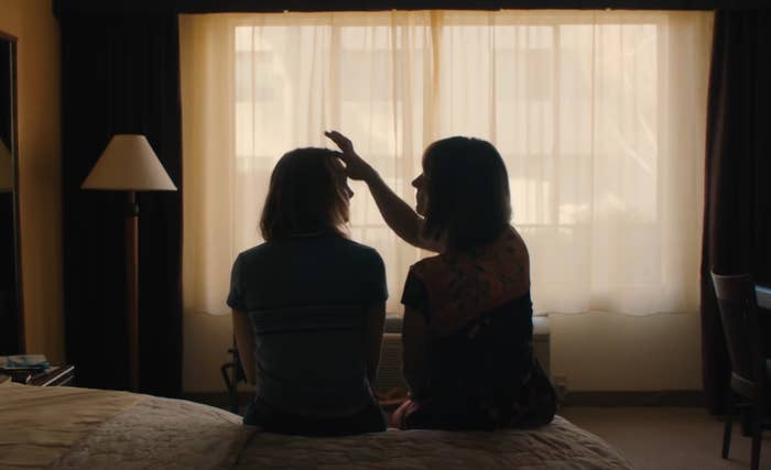 Lady bird and Marion sit on a bed together in the movie &quot;Lady Bird&quot;
