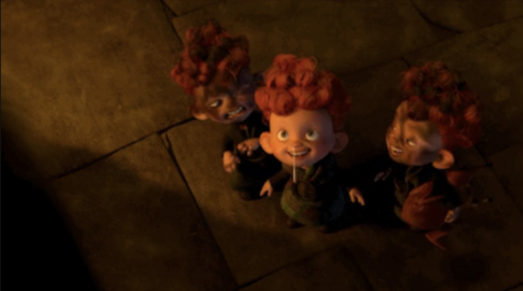 The three naughty triplets from Pixar&#x27;s &quot;Brave&quot; grin up at somebody