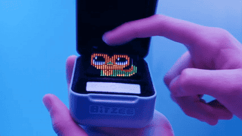 gif of a child petting the virtual pet