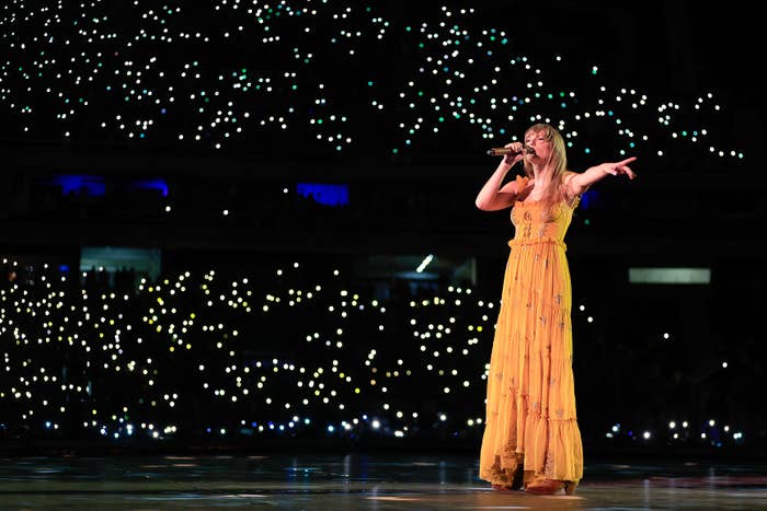 Close-up of Taylor performing onstage