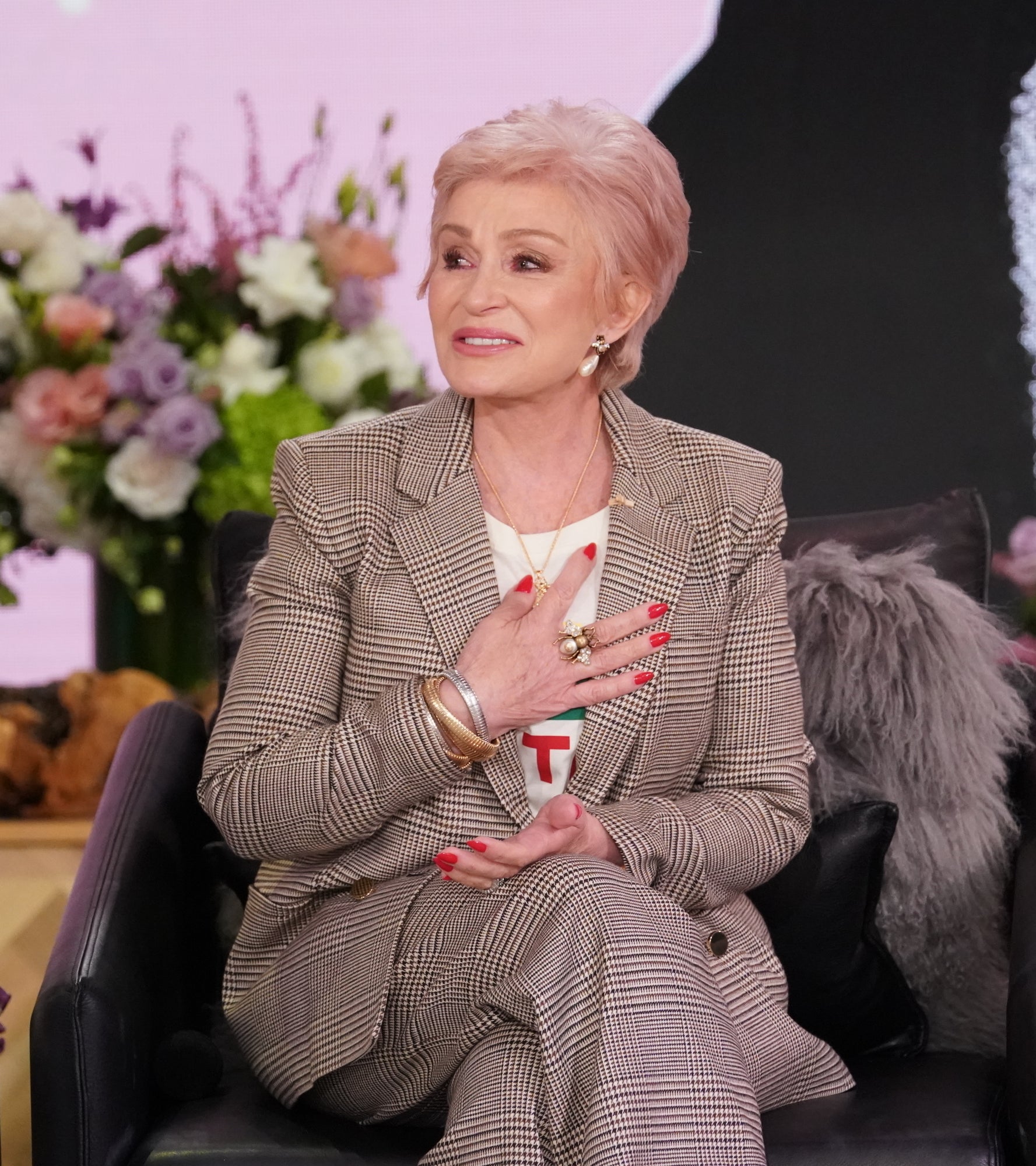 Close-up of Sharon sitting and speaking during an interview