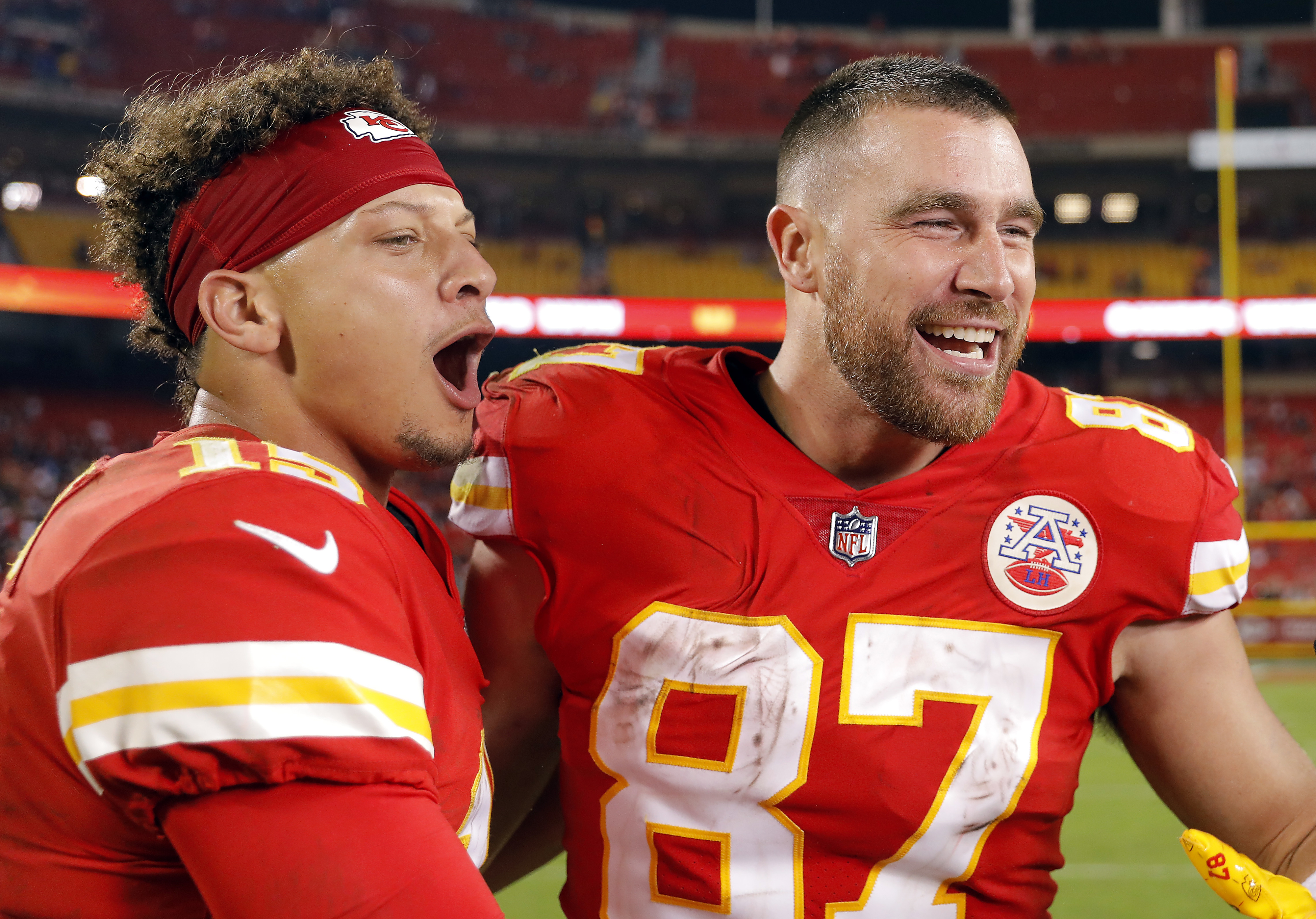 Closeup of Patrick and Travis celebrating on the field