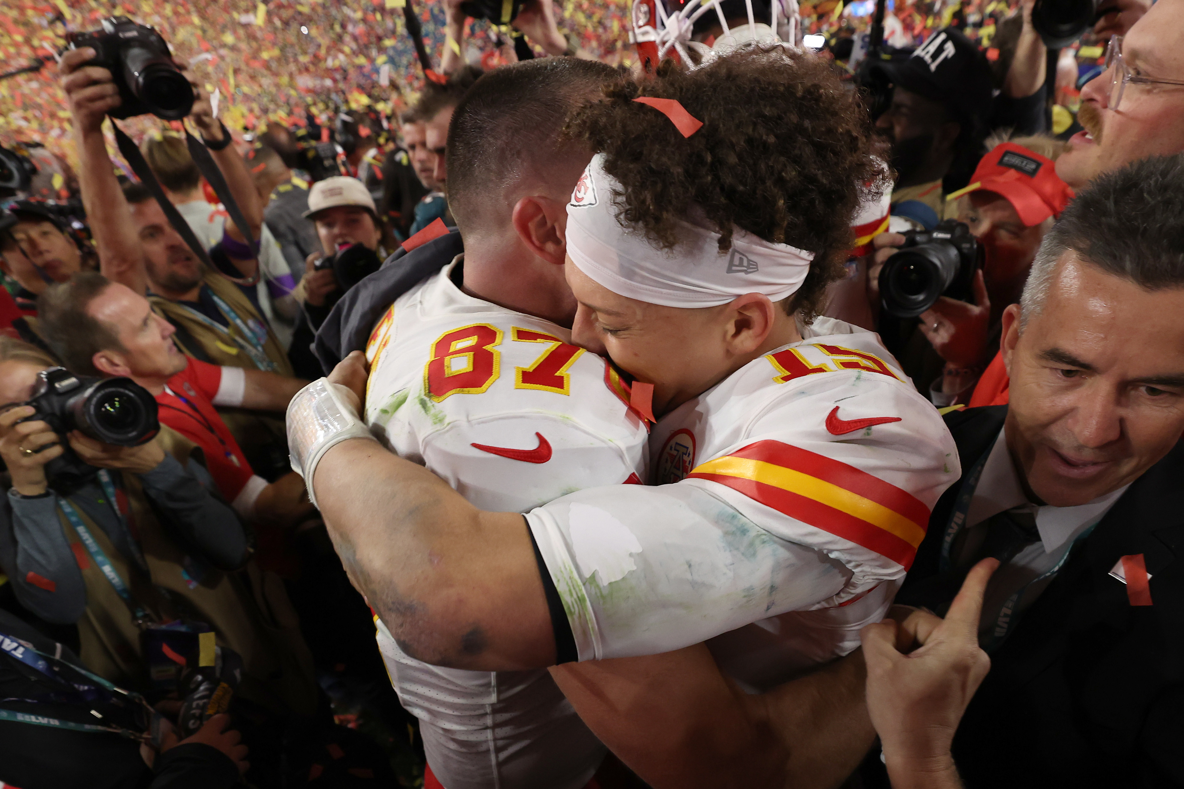 Travis and Patrick embracing after a game