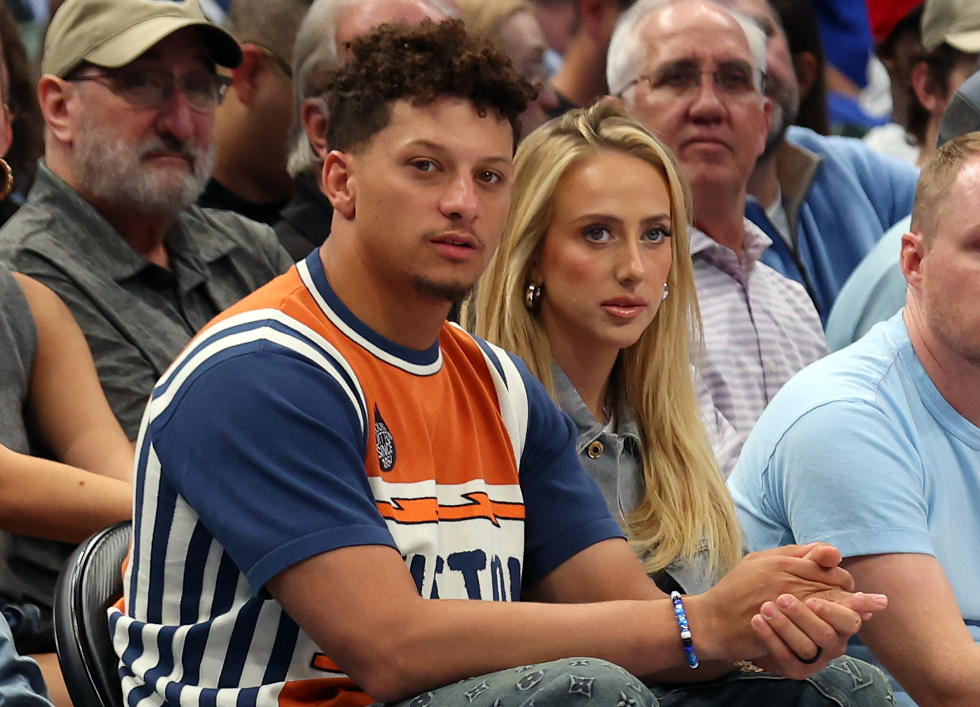 Closeup of Patrick and Brittany Mahomes sitting at a game