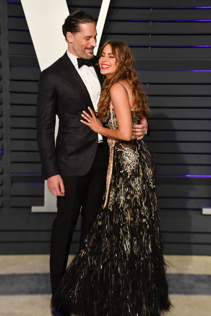 Joe Manganiello and Sofia Vergara smiling and embracing on the red carpet