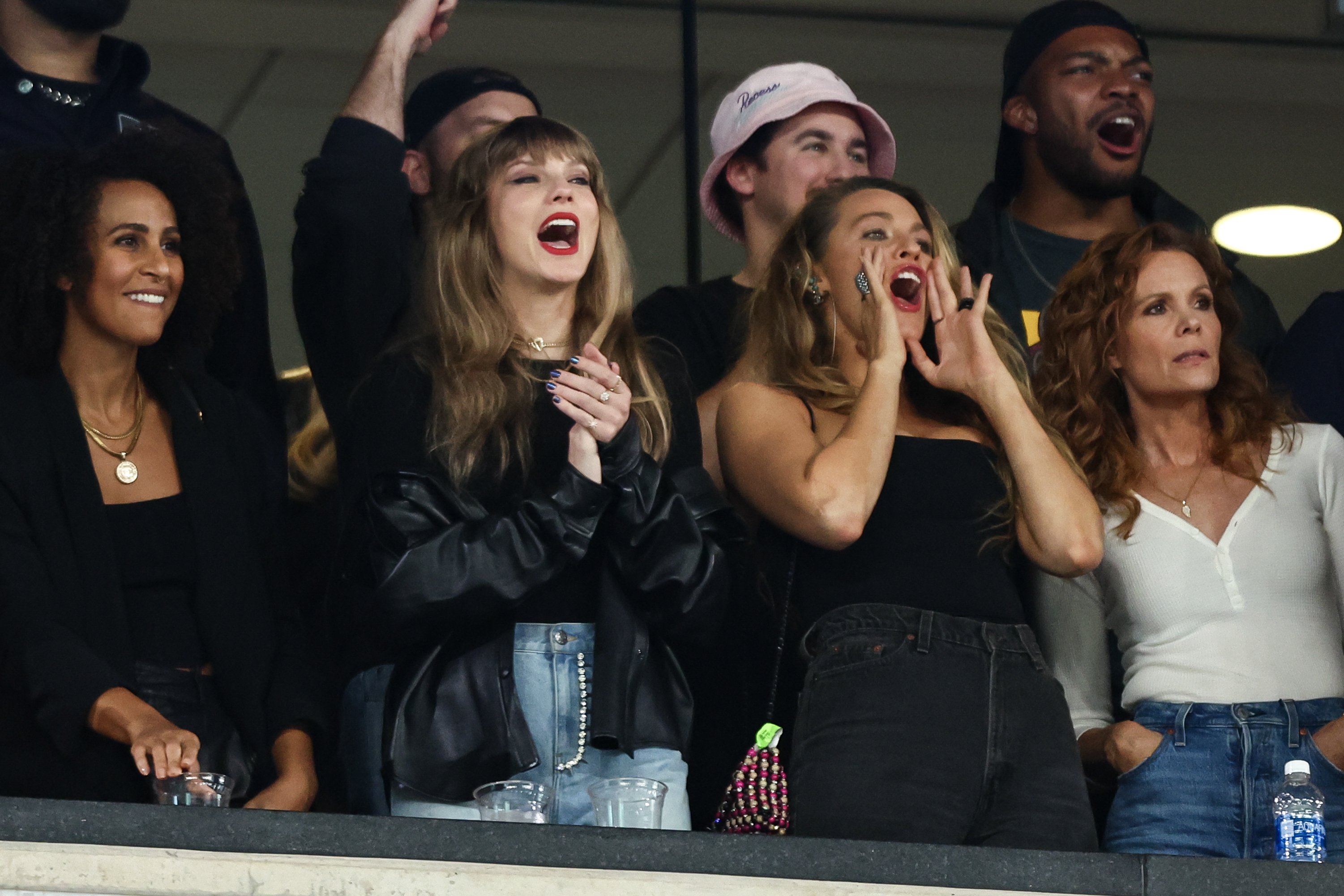 Taylor in the stands at a football game