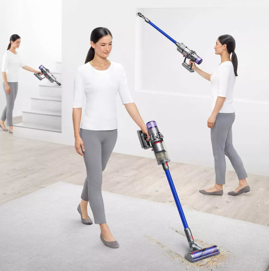 model using Dyson vacuum in multiple settings around home