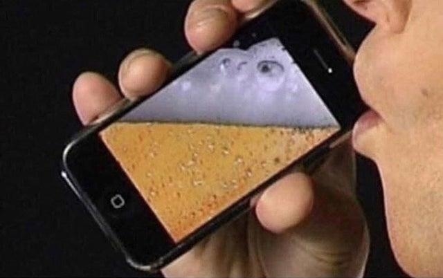 Someone using their phone to drink beer on an app