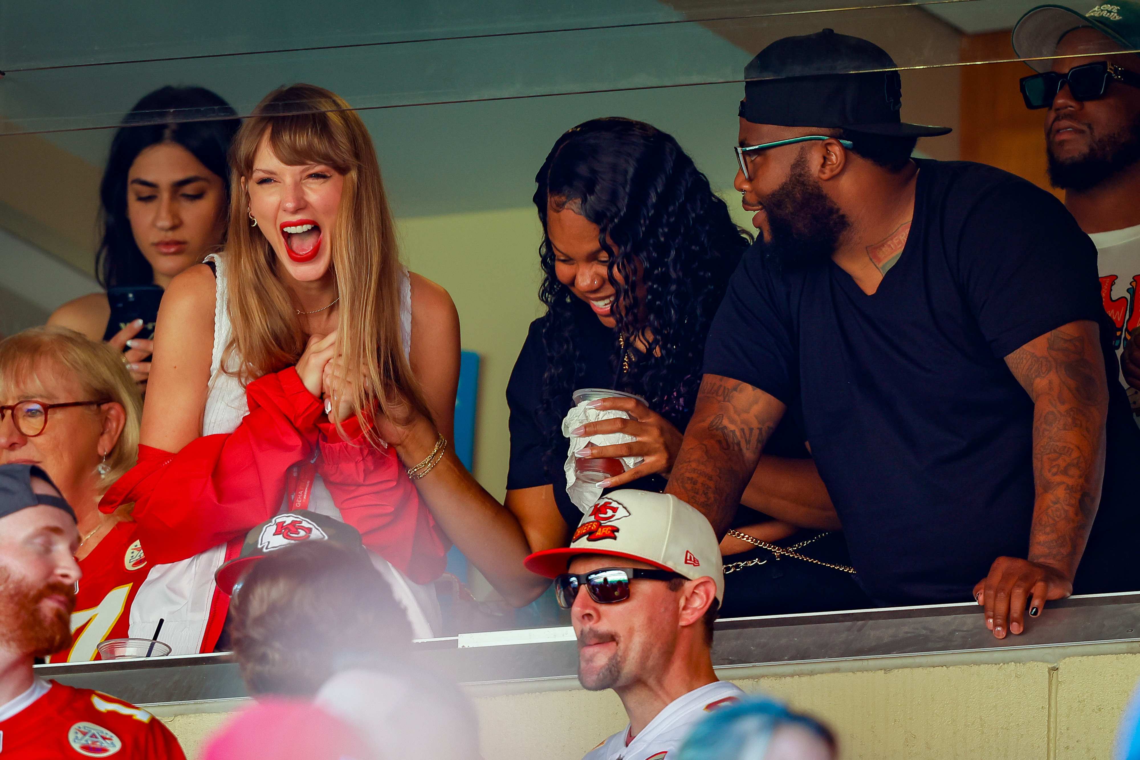 Taylor at the game with friends