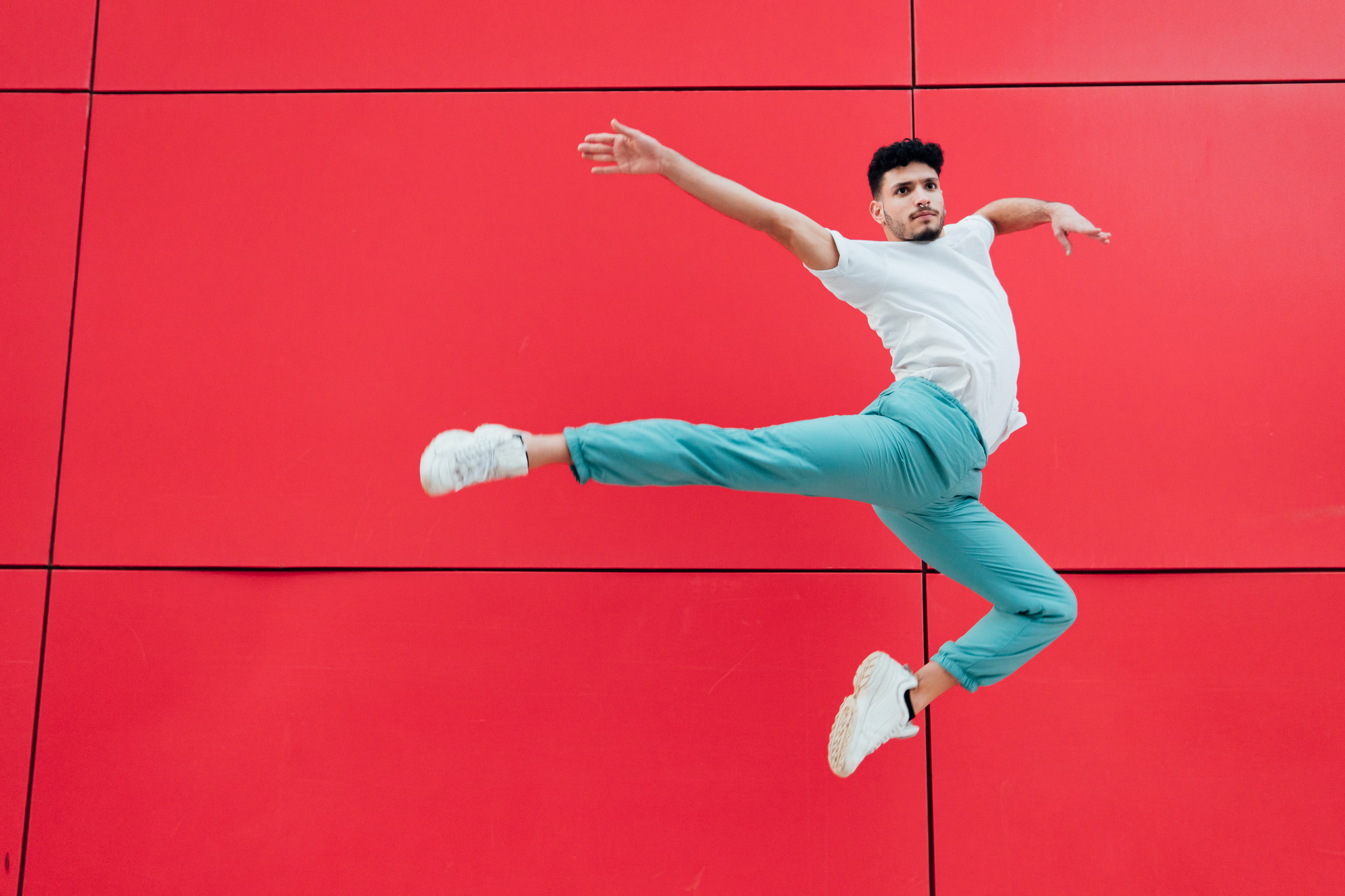 A male dancer in mid-air