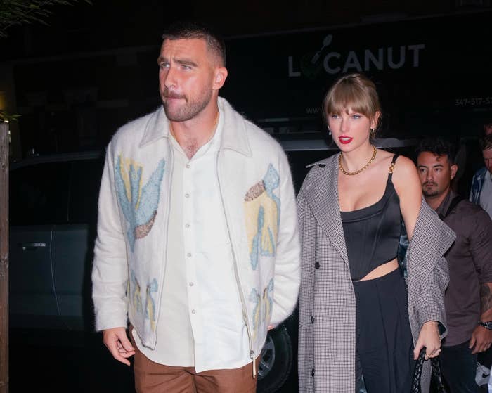 Closeup of Travis Kelce and Taylor Swift having a night out