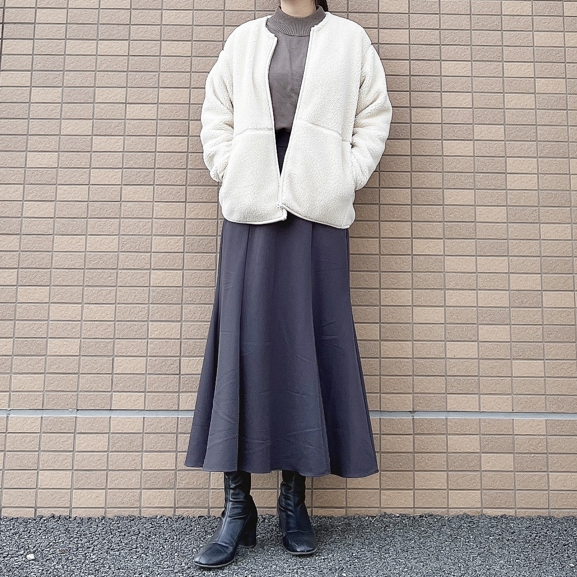 無印良品のおすすめトップス「洗えるニットハイネックセーター」