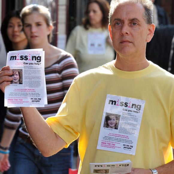 Kevin Gosden hands out leaflets showing his missing son Andrew