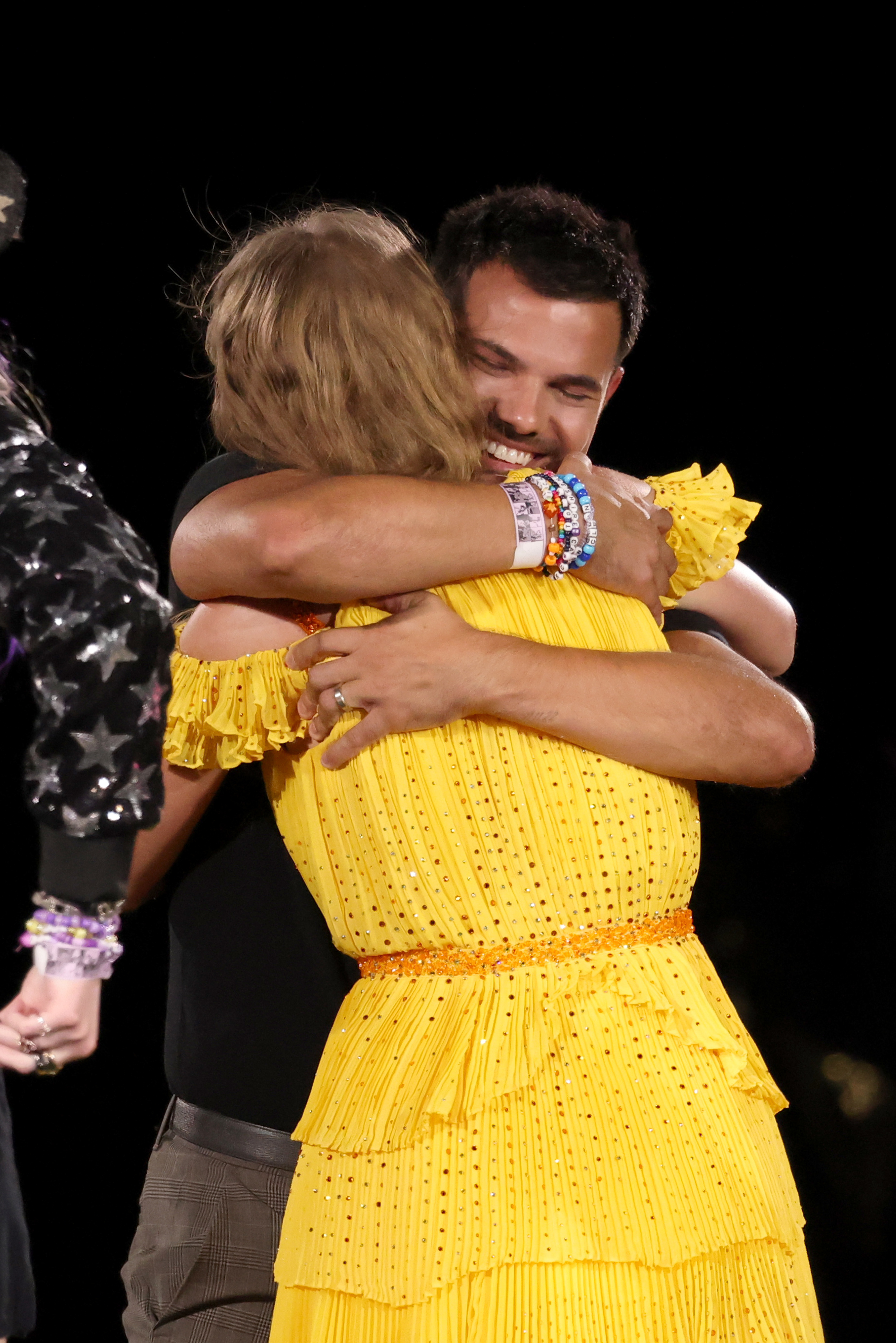 Taylor and Taylor hugging