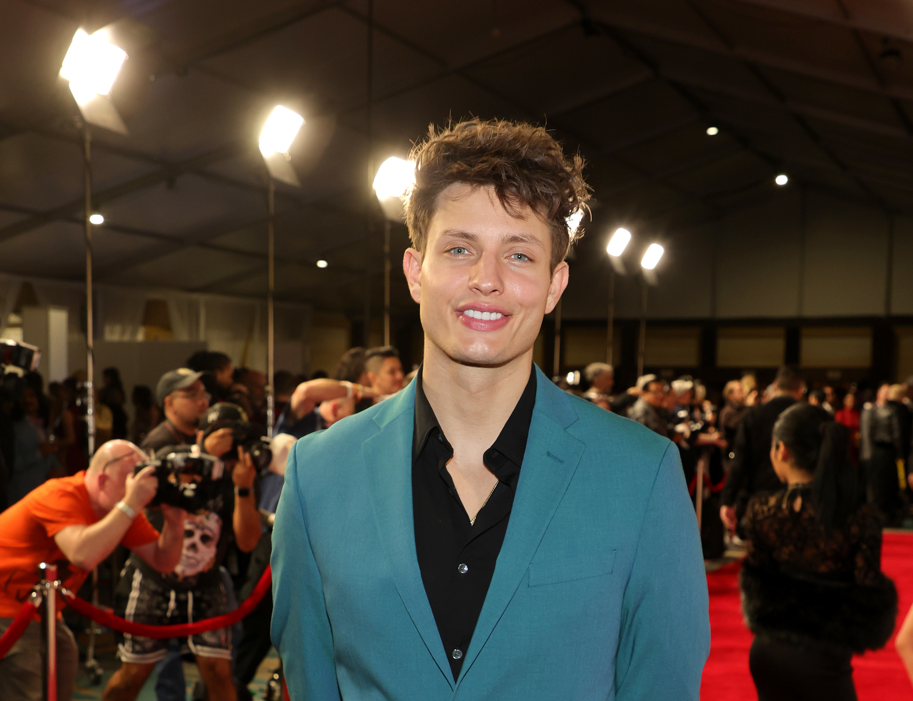 Closeup of Matt Rife in a blazer on the red carpet