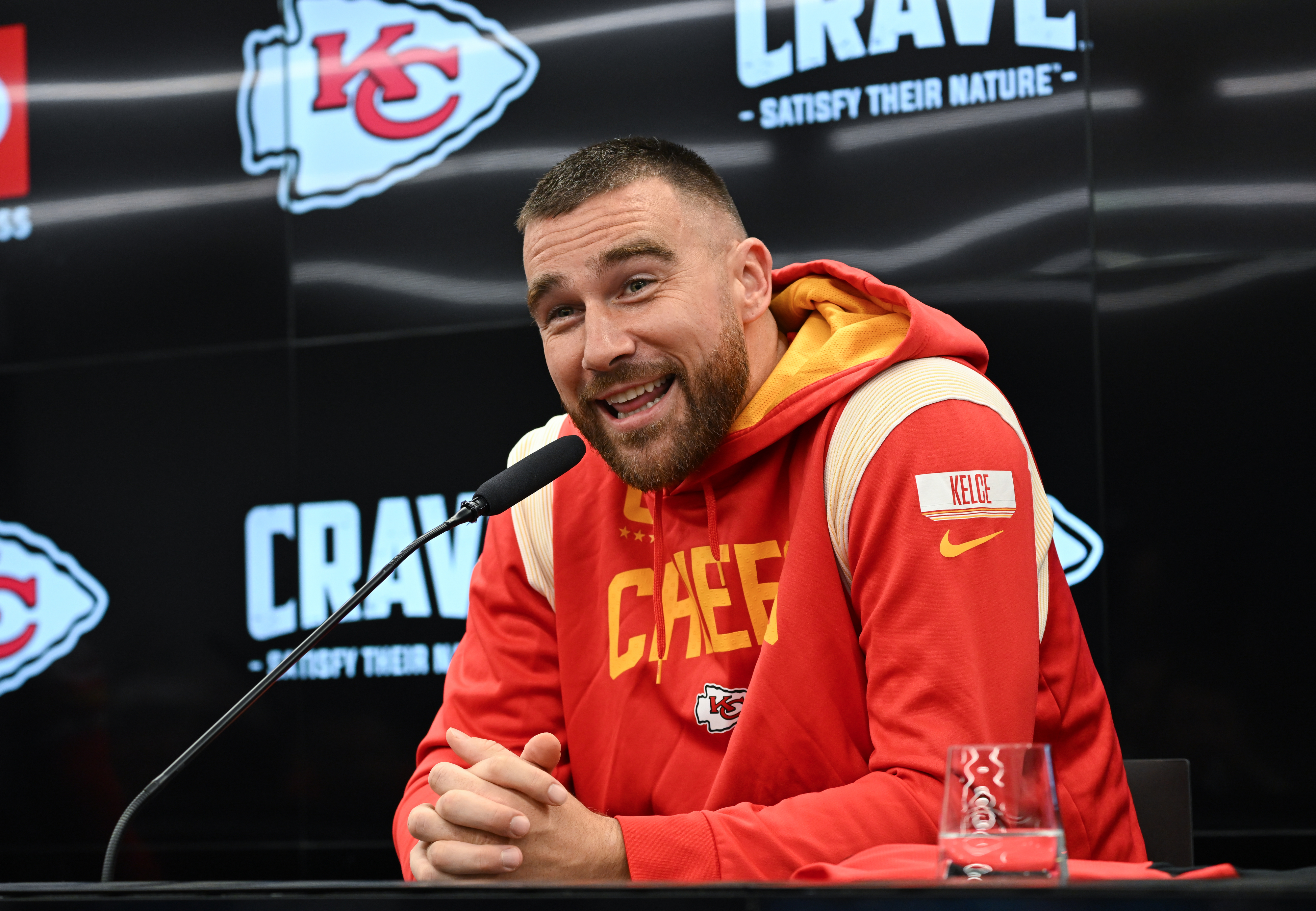Travis Kelce speaking during a press conference