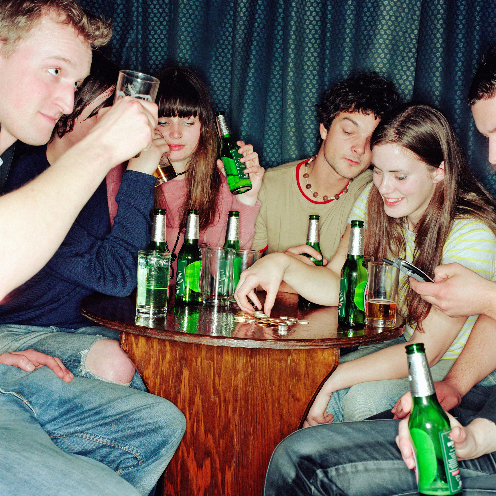 people drinking around a table