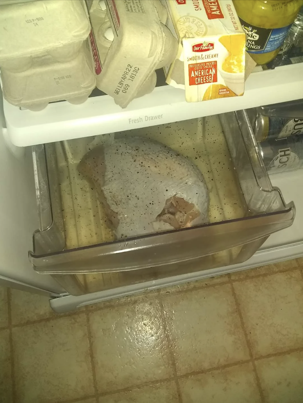 meat in an empty fridge tray
