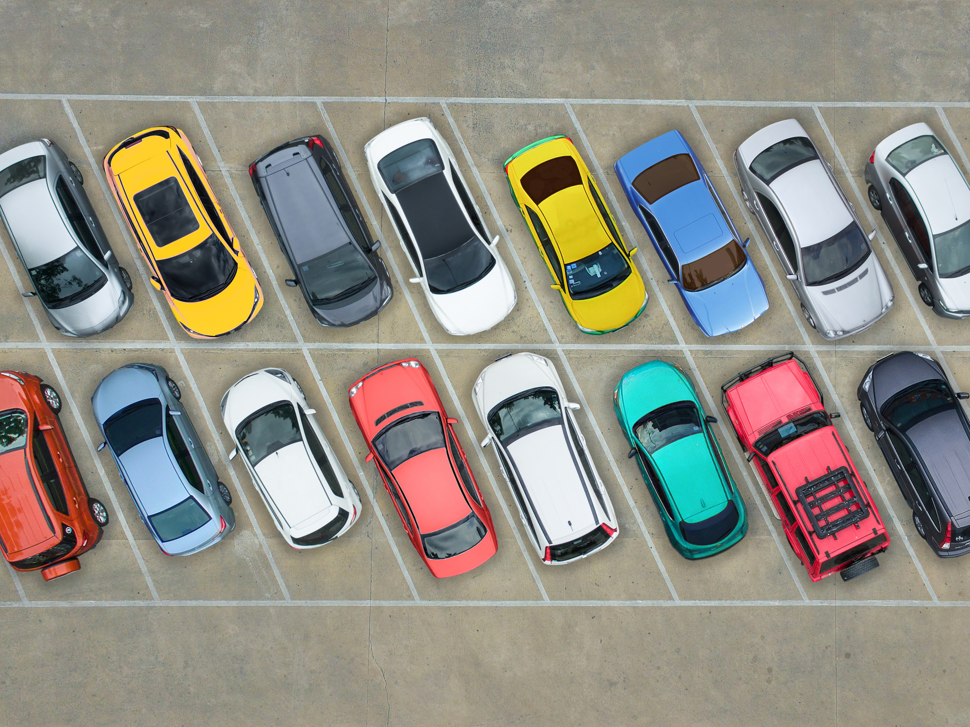 Aerial view of cars parked in a parking lot