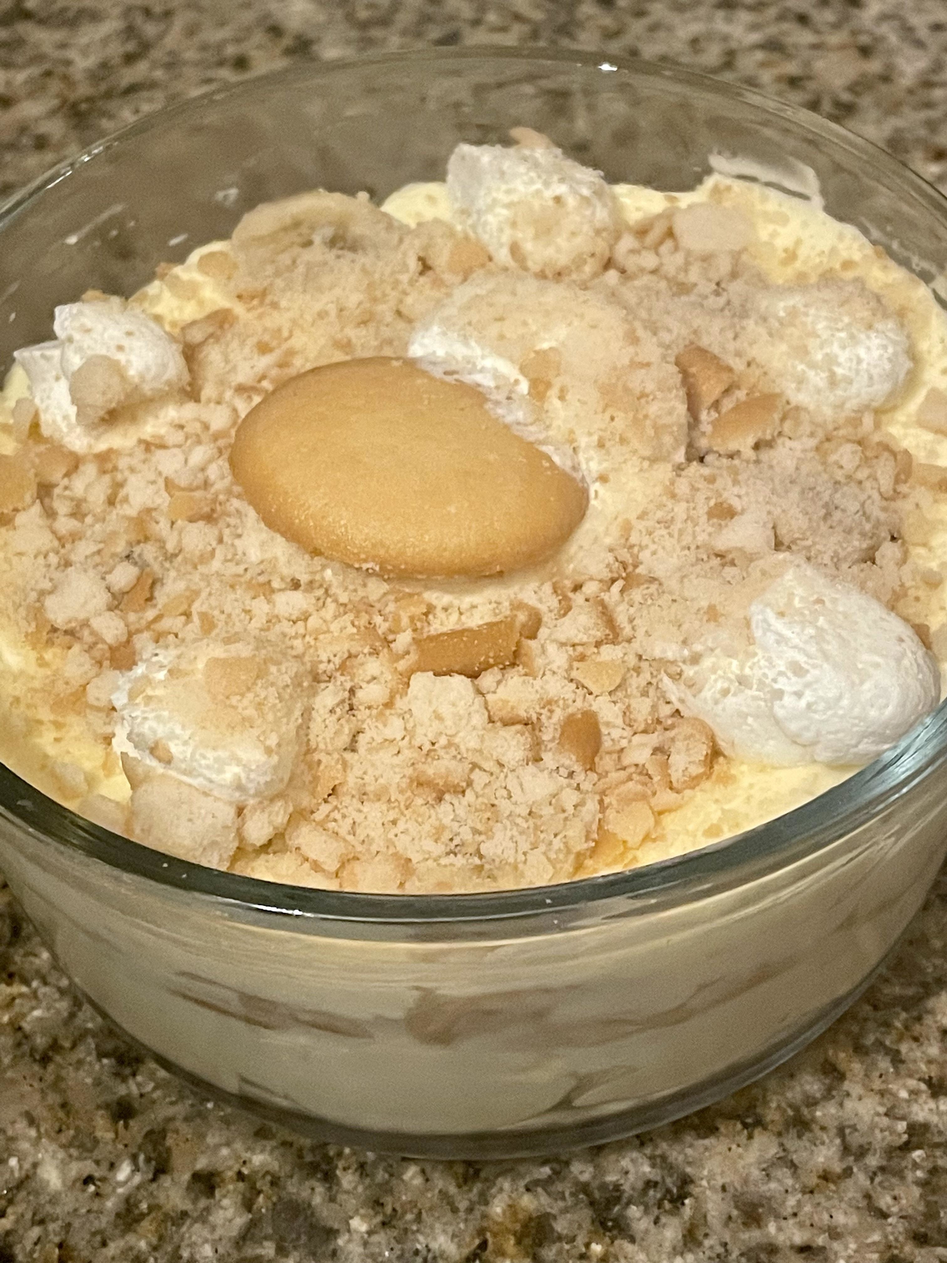 Banana pudding in a large glass bowl