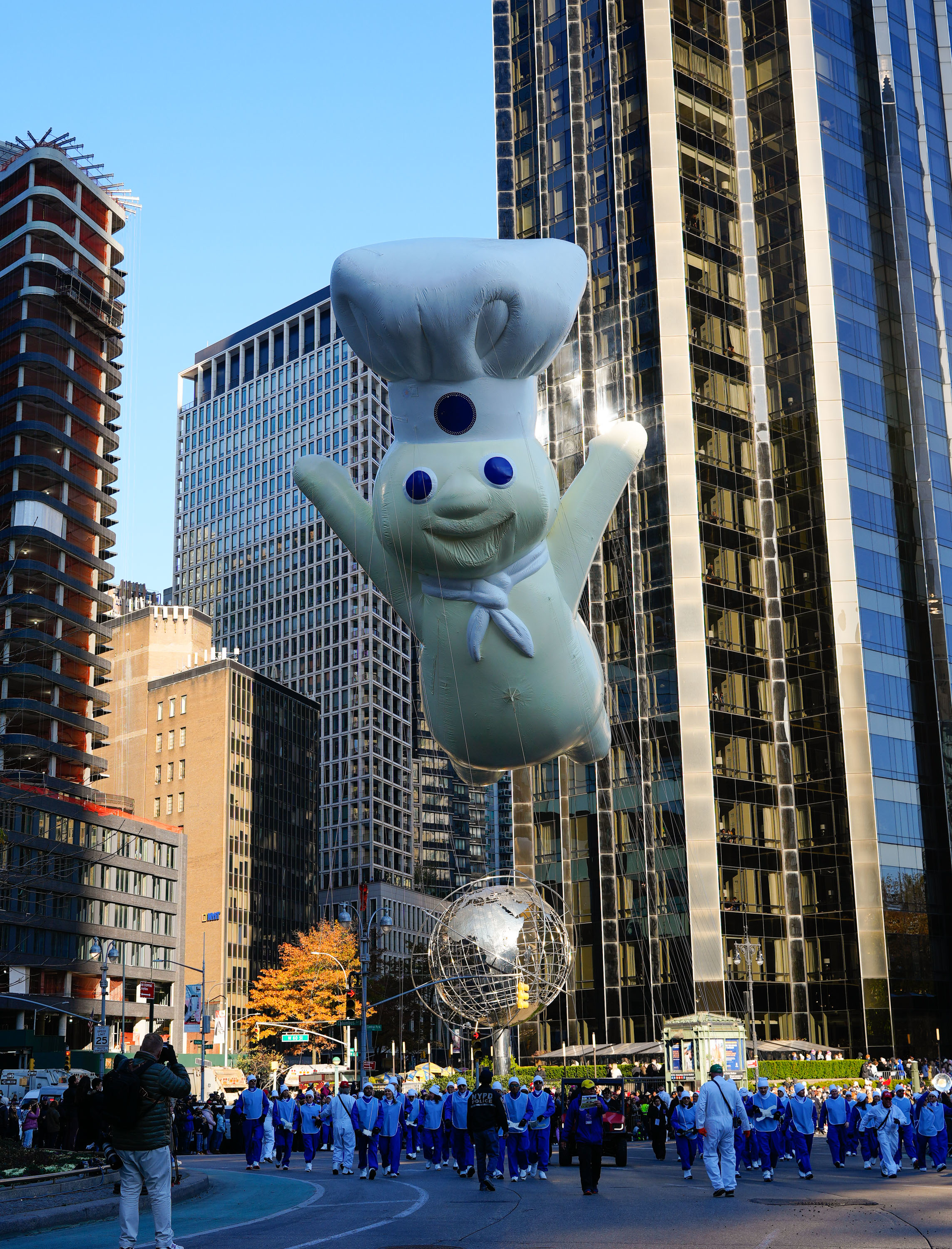 Pillsbury Doughboy balloon at the parade with his hands out