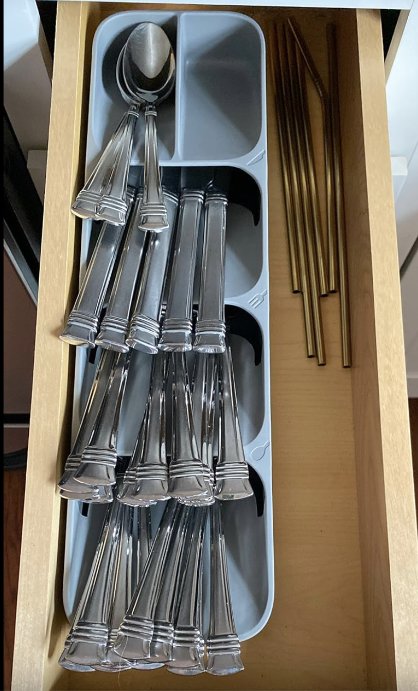 a reviewer&#x27;s neat blue slim organizer with cutlery inside