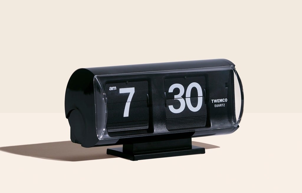 a mid-century styled rounded clock