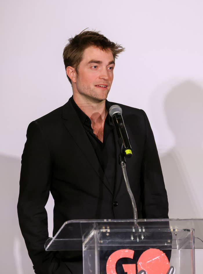 Robert speaking at a podium