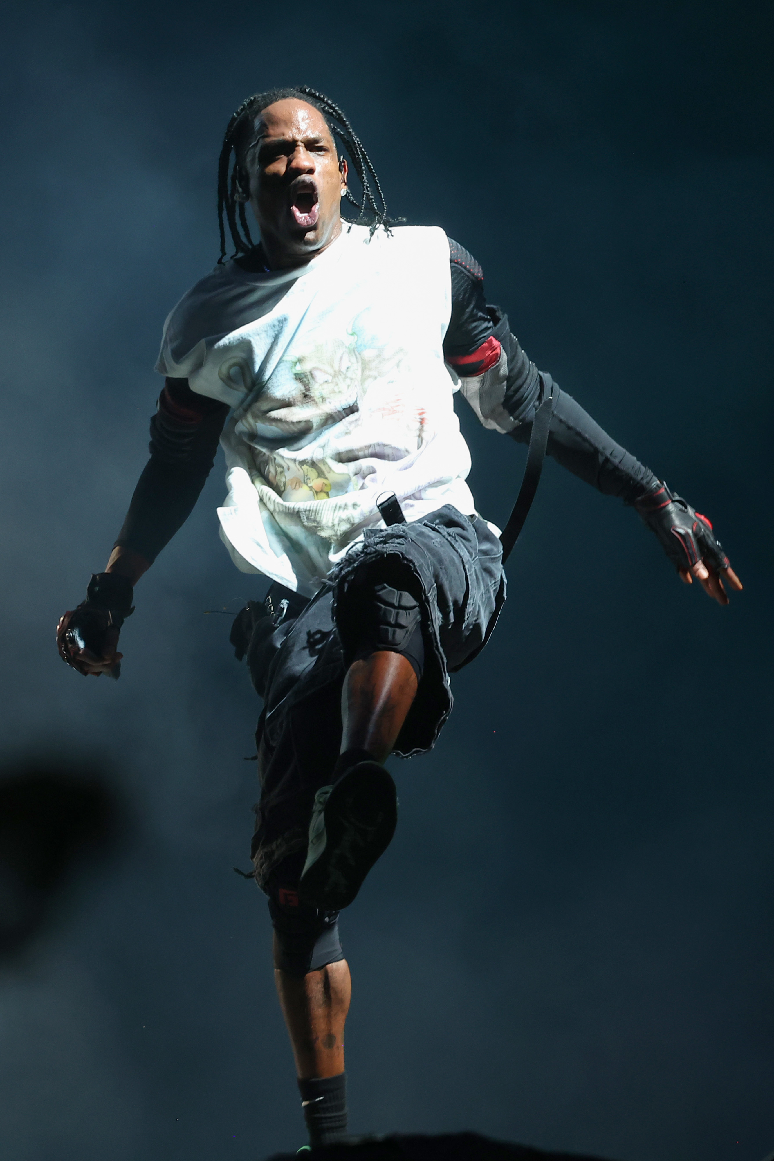 Travis jumping on stage